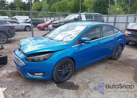 2015 Ford Focus Titanium from USA, damaged, VIN 1FADP3J27FL287249